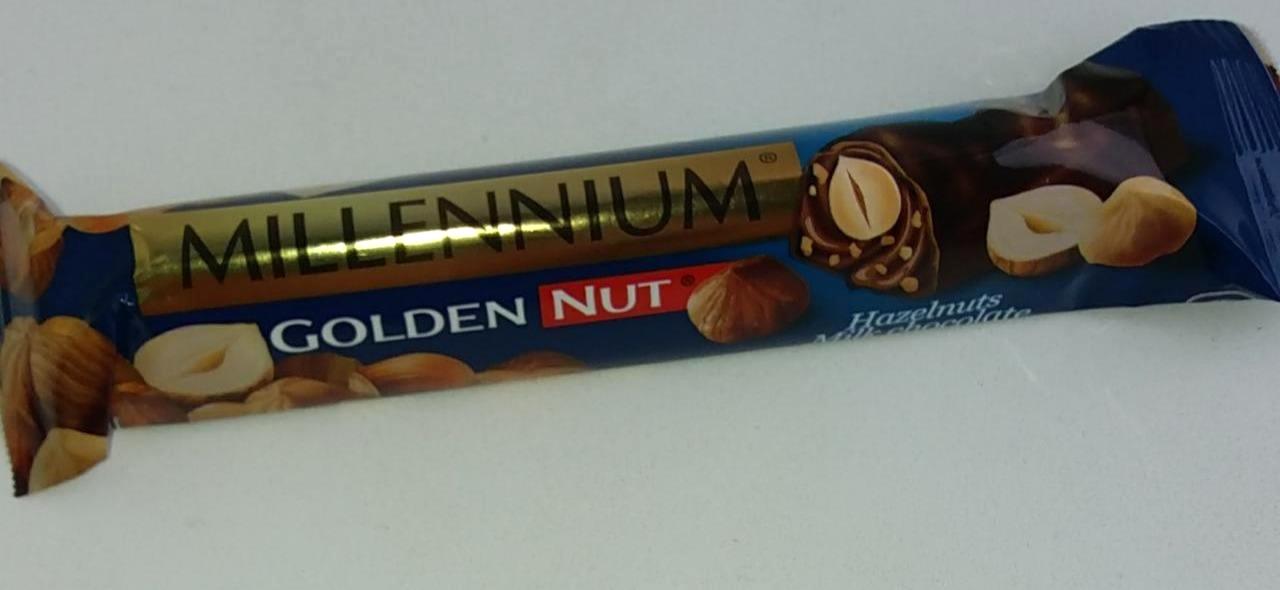 Фото - Батончик молочный шоколад с лесными орехами Golden Nut Миллениум Millennium