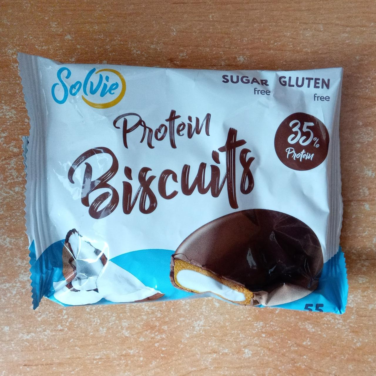 Фото - Печенье Protein Biscuits протеиновое, глазированное молочным шоколадом, с белково-кремовой начинкой Кокос без сахара Solvie