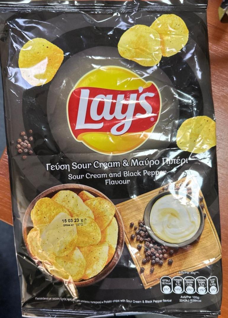 Фото - Чипсы картофельные со вкусом сметаны и черного перца Lay’s