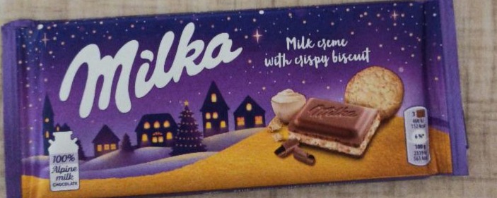 Фото - мололчный шоколад с молочной начинкой со вкусом ванили и хрустящим ванильным печеньем Milka