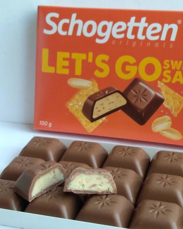 Фото - молочный шоколад с начинкой из арахисовой пасты и кусочками солёного печенья Schogetten