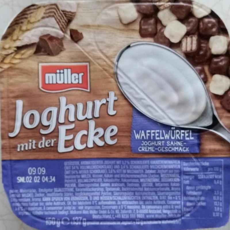 Фото - Йогурт с кусочками вафель глазированных шоколадом Müller