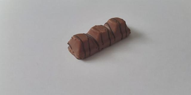 Фото - Вафельный батончик крем-фундук с молочно-ореховой начинкой в молочном шоколаде Ozera