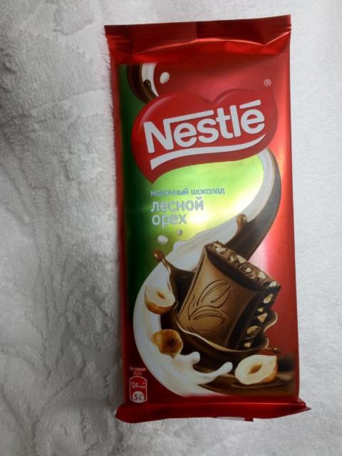 Фото - Шоколад молочный лесной орех Nestle