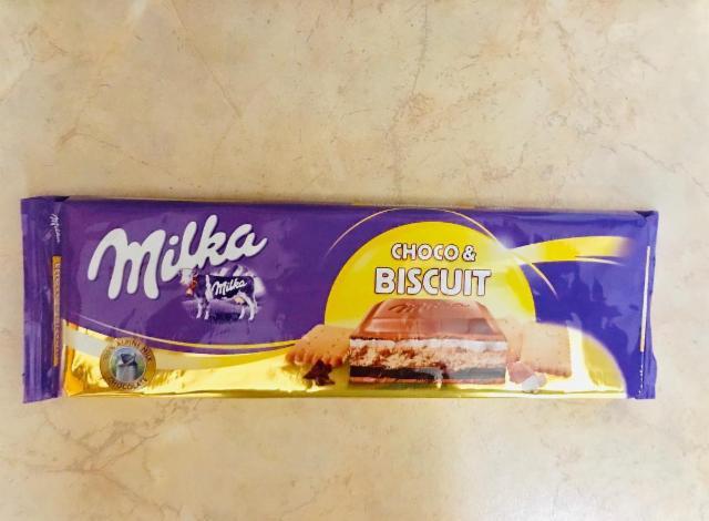 Фото - Шоколад молочный с шоколадной и молочной начинками и печеньем Milka Милка