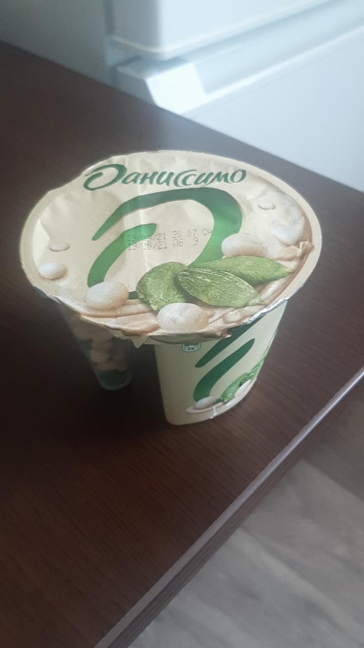 Фото - Наполнитель для йогурта Даниссимо Deluxe семечки в белой шоколадной глазури Danone