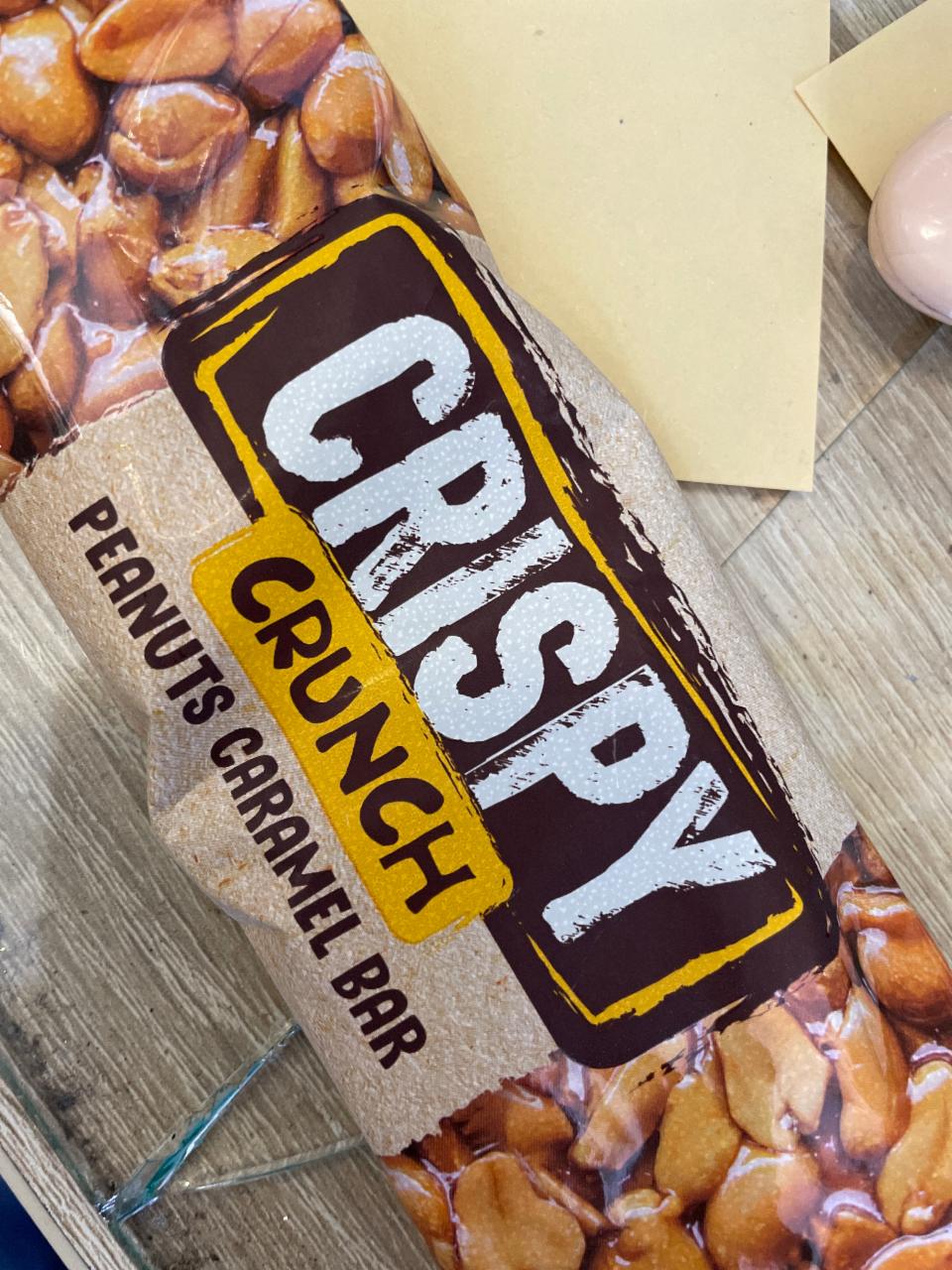 Фото - Батончик арахисовый карамельный Crunch Crispy Korona