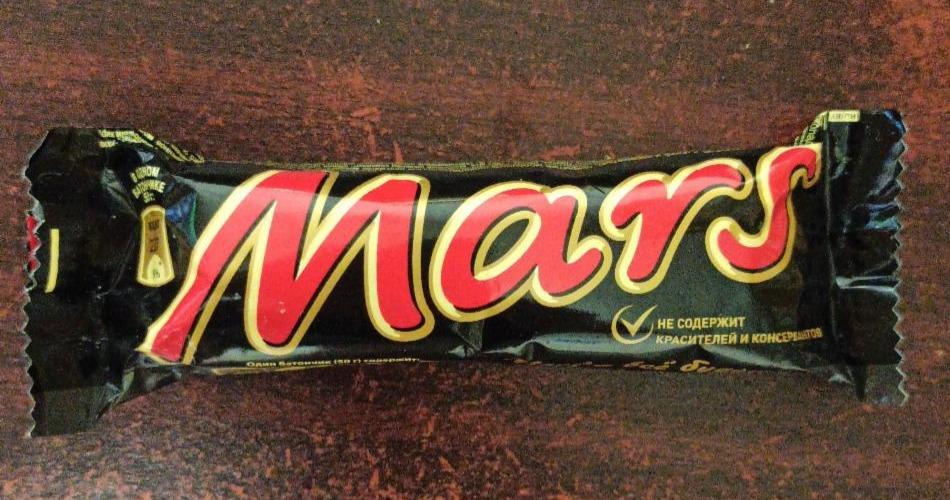 Фото - Шоколадный батончик Марс с нугой и карамелью, покрытый молочным шоколадом Mars