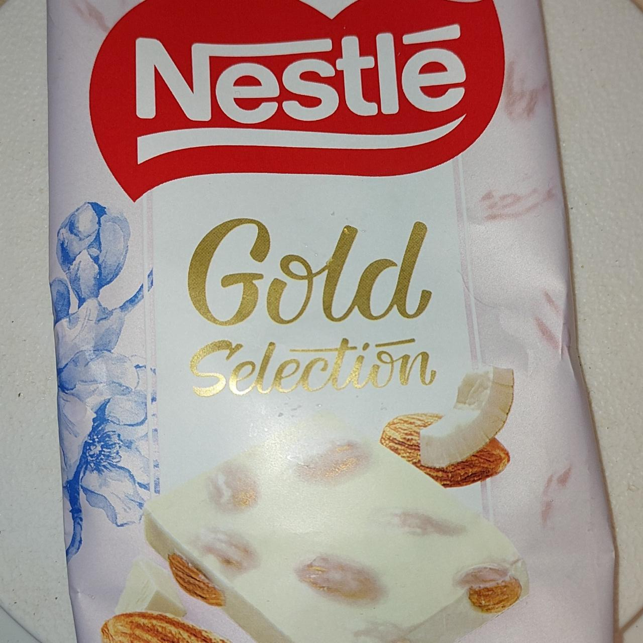 Фото - Белый шоколад с цельным миндалём Nestle