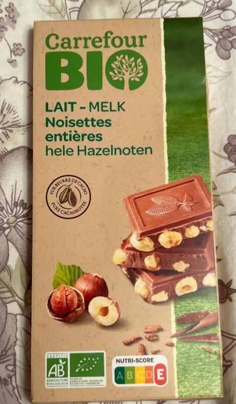 Фото - шоколадка Lait-Melk Noisettes entières Carrefour