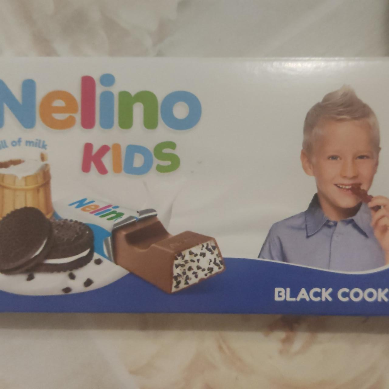 Фото - Молочный шоколад с молочной начинкой и крошкой печенья с какао Nelino kids Nelly