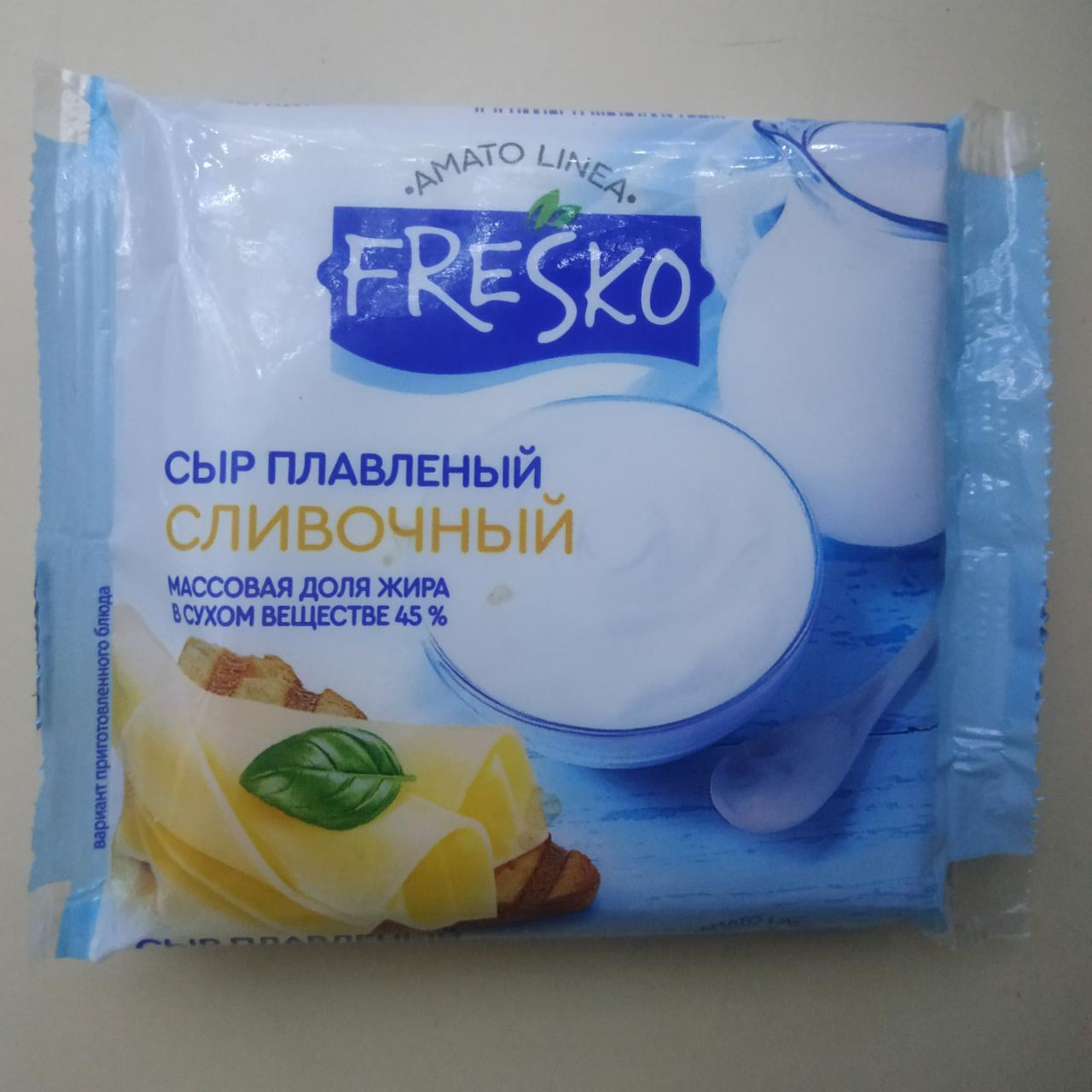 Фото - Сыр плавленный сливочный ломтики Fresko
