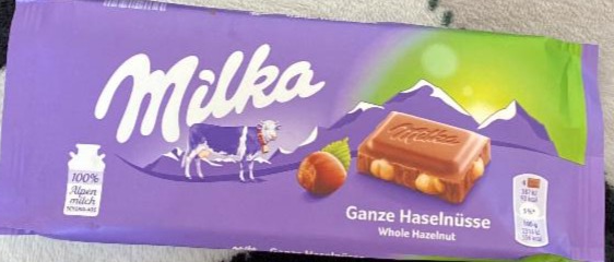 Фото - молочный шоколад с целыми лесными орехами Milka