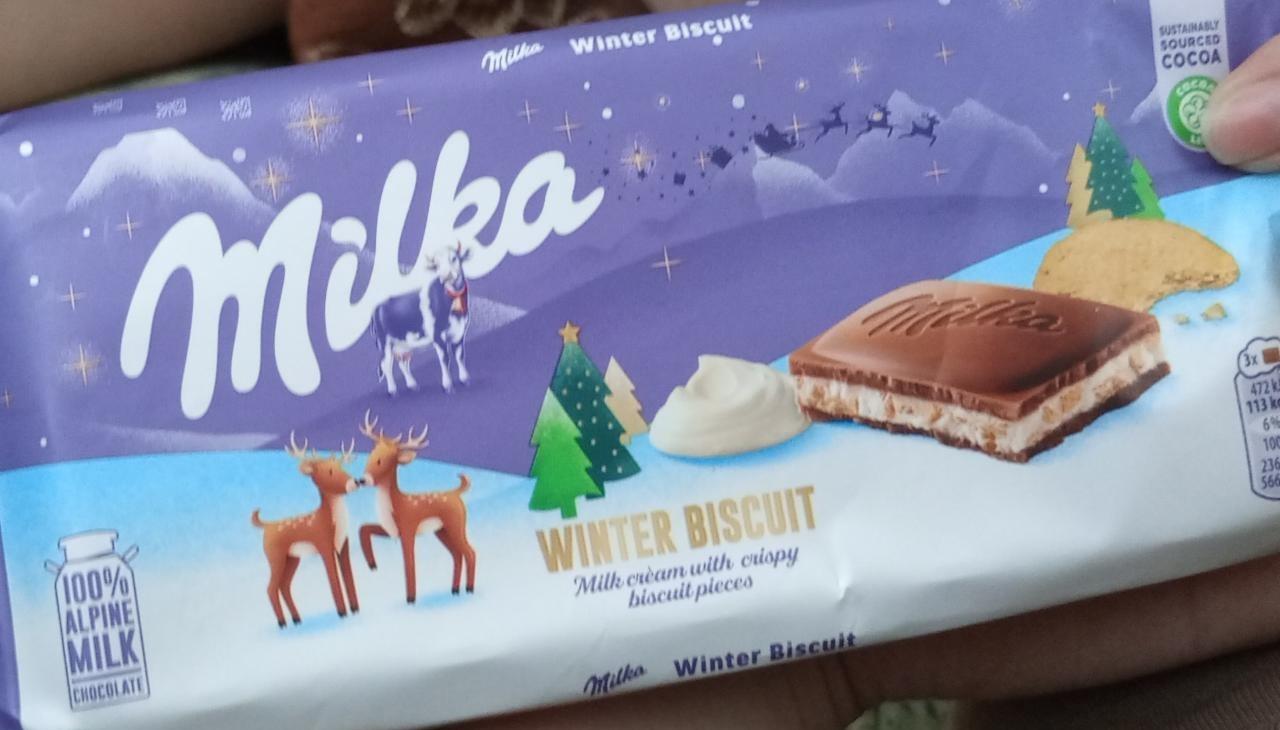 Фото - Winter Biscuit Milk Chocolate with Milk Filling and Pieces of Bisciuts Milka