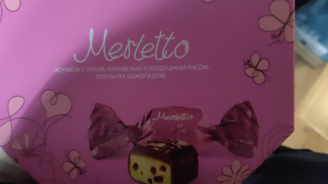 Фото - конфета с нугой, карамелью и воздушным рисом, покрыта шоколадом Merletto