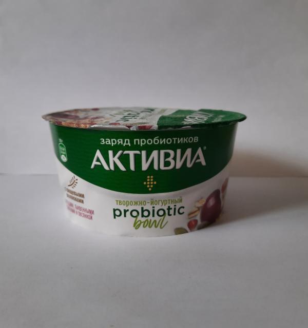 Фото - продукт творожно-йогуртный с пищевыми волокнами и с вишней,овсом,семенами тыквы и соком граната ягоды-семена-овес 'Активиа probiotic'