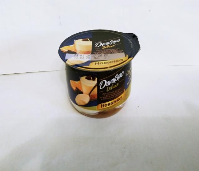 Фото - Йогуртный десерт 'Даниссимо' Deluxe с апельсином, шоколадной крошкой и вкусом ванили