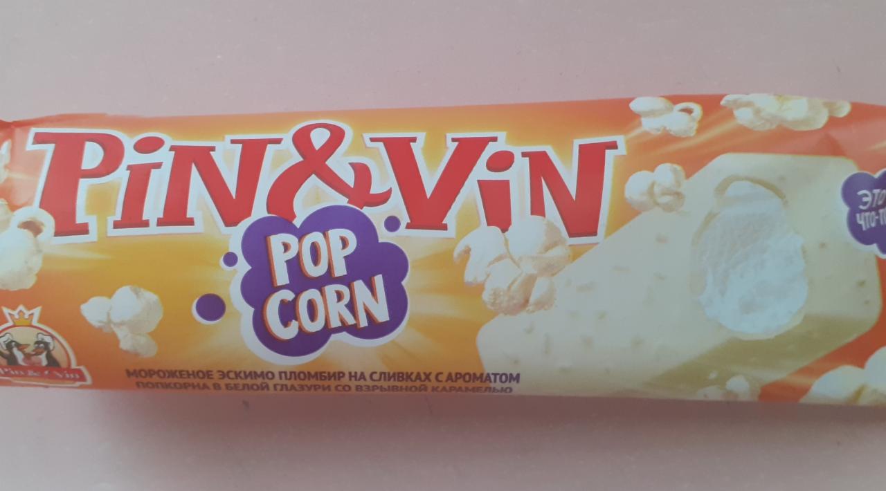 Фото - мороженое эскимо пломбир на сливках с ароматом попкорна в белой глазури со взрывной карамелью Pin&vin