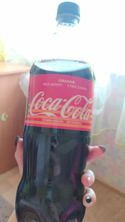 Фото - газированный напиток со вкусом апельсина Coca Cola