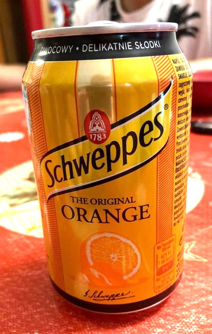 Фото - Напиток безалкогольный газированный с апельсиновым вкусом Orange Schweppes