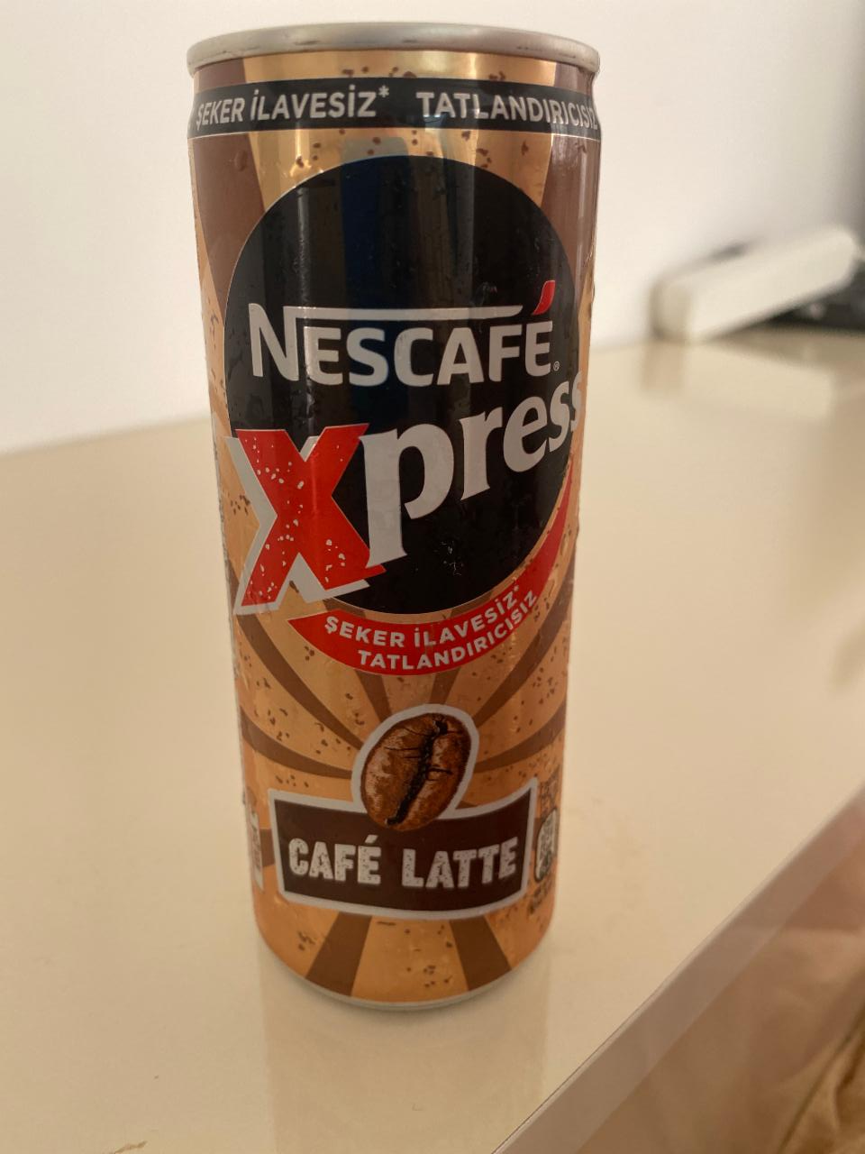 Фото - Напиток кофейный express latte латте в банке Nescafé