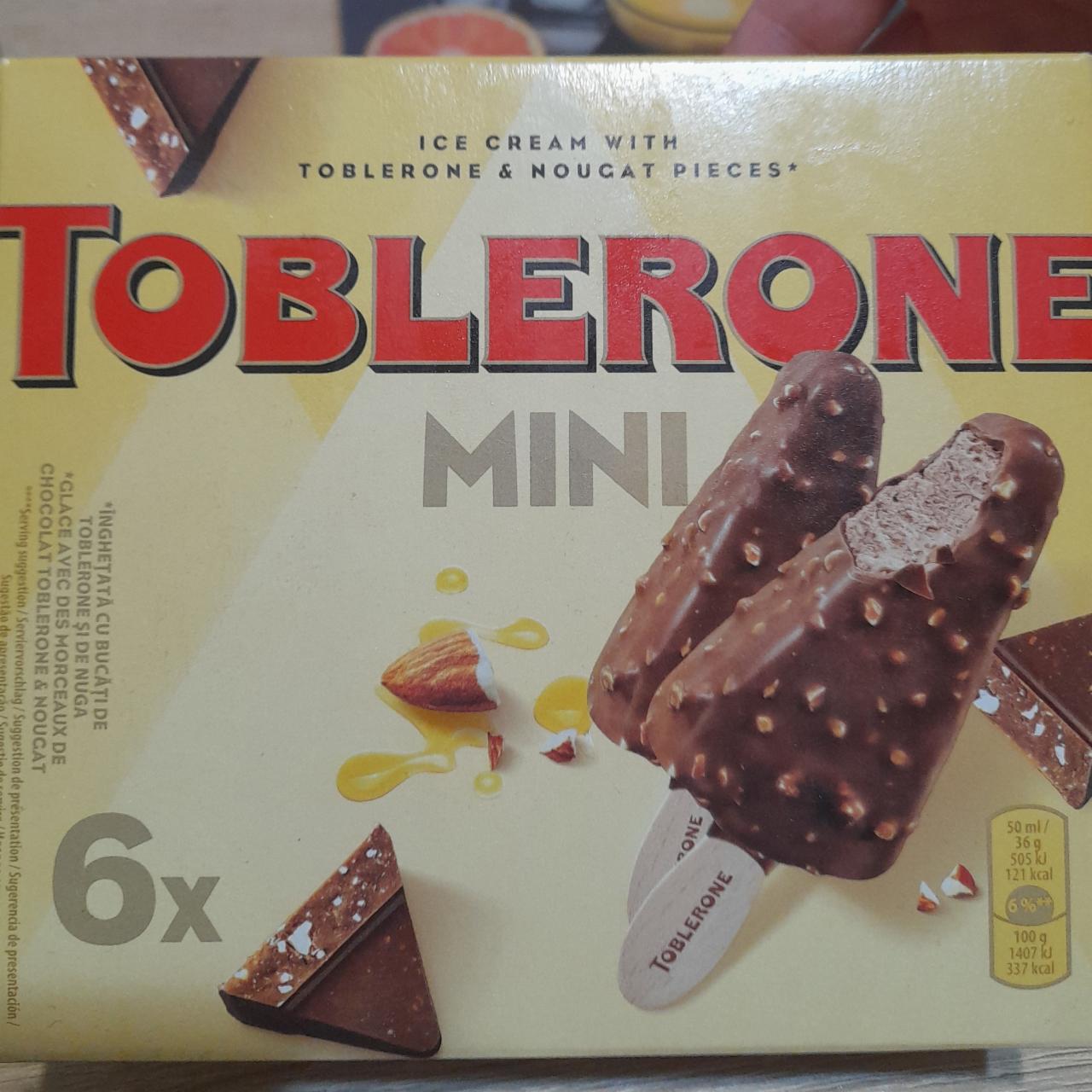 Фото - Мороженое шоколадно-медовое покрытое молочным шоколадом с кусочками белой нуги и кусочками шоколада Ice Cream Toblerone mini