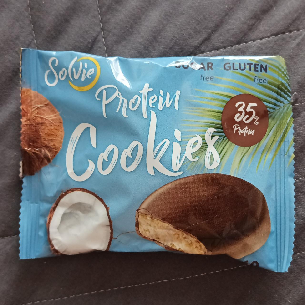 Фото - Печенье Protein cookies протеиновое кокосовое с кокосовой стружкой, глазированное молочным шоколадом, без сахара Solvie