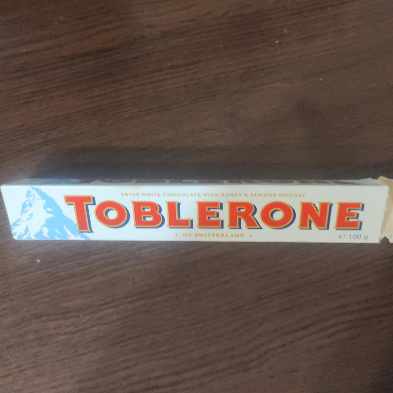 Фото - белый шоколад швейцарский с медовой нугой и миндалем Toblerone