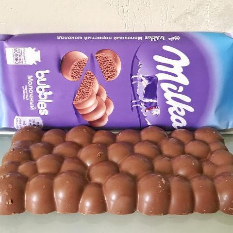 Фото - шоколад молочный пористый bubbles Milka