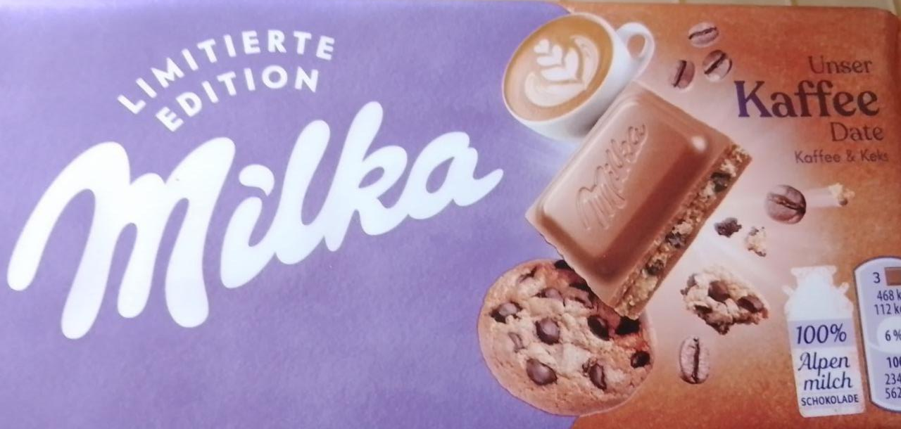 Фото - Шоколад Милка молочная с кремовой начинкой со вкусом кофе и печенья с кусочками шоколада Milka