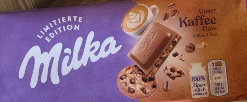 Фото - Шоколад Милка молочная с кремовой начинкой со вкусом кофе и печенья с кусочками шоколада Milka